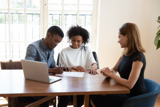 Attorney Meeting Client in Office